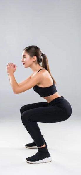 mladá žena cvičí squaty