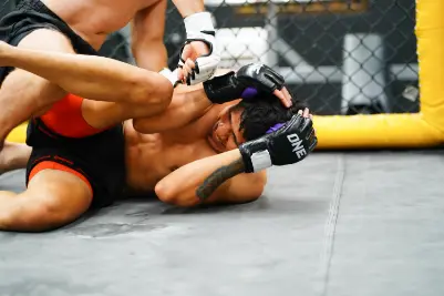 MMA fighter training with quality gloves